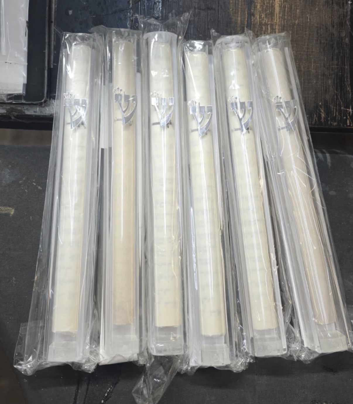 New kosher mezuzah scrolls ready for delivery