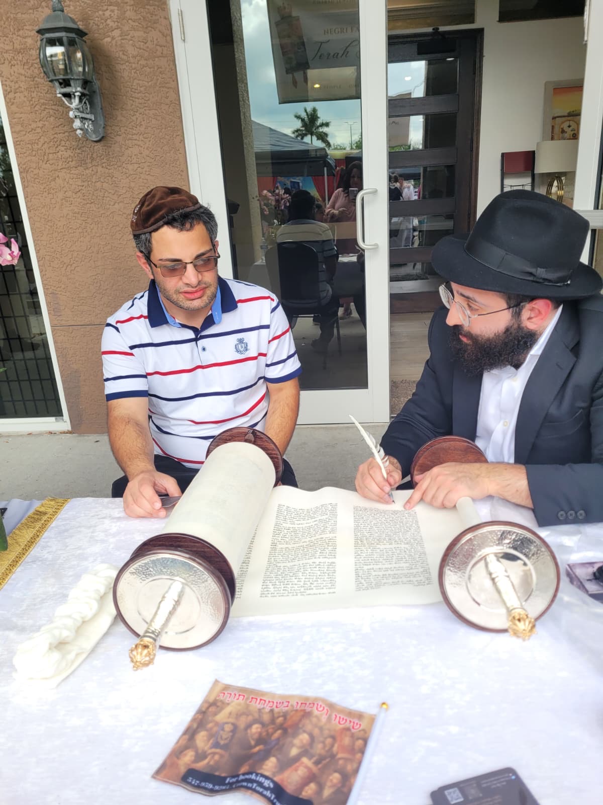 Writing a letter in a Sefer Torah with Levi